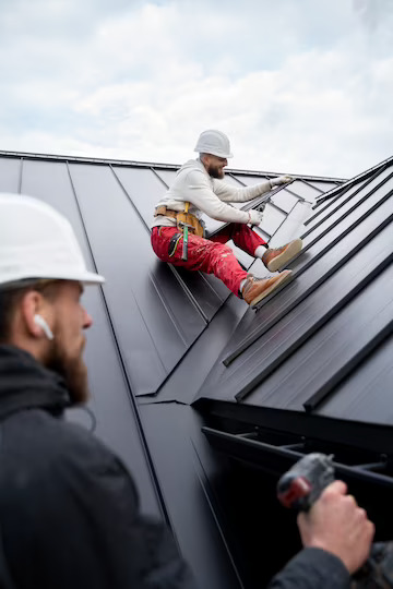 construction-people-working-roof_23-2149343666